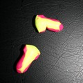 A pair of extra-foamy earplugs. These things expand IN your ear, blocking out virtually ALL sound!