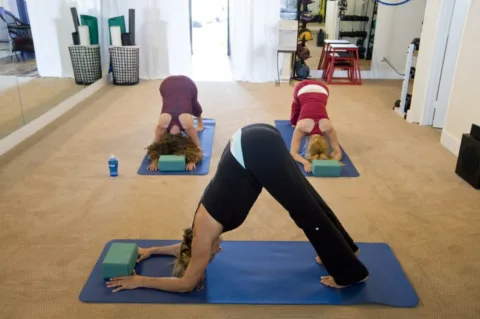 you can do yoga stretches in a small class or a large class